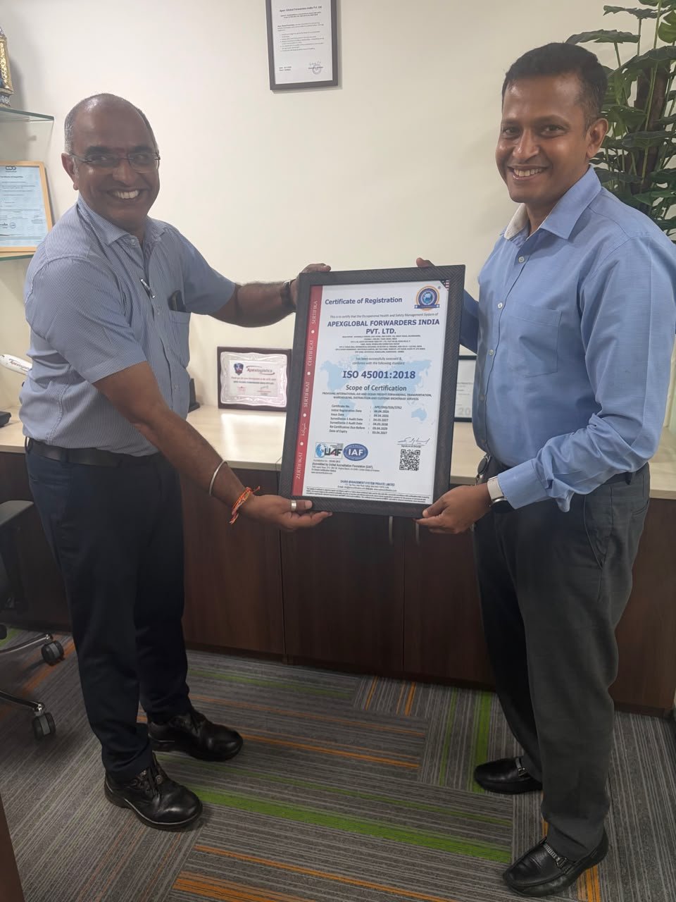 Impleton consultant handing over an ISO 45001:2018 certificate to a client in Chennai