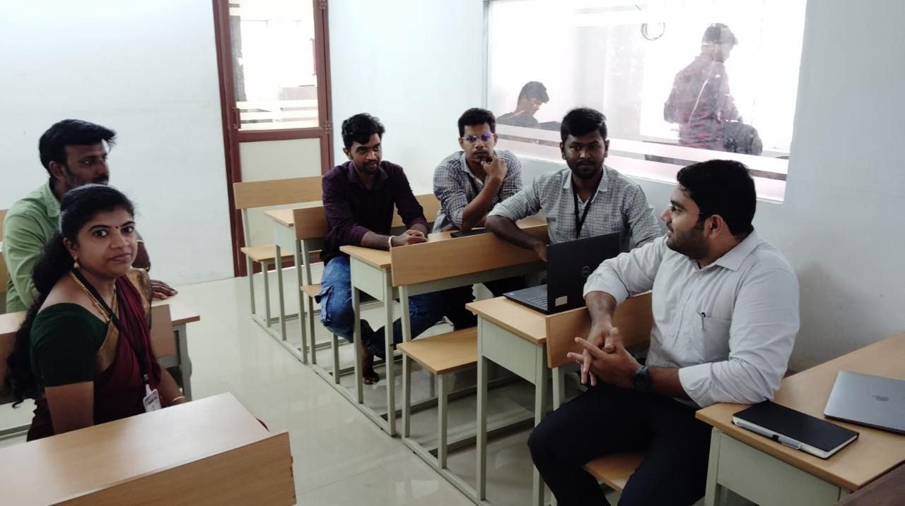 Impleton lead auditor conducting an awareness training session for client staff